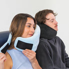 Traveler demonstrating how easy it is to put on the Airze travel pillow in blue, with another traveler comfortably resting using the black version for superior neck support and travel comfort.