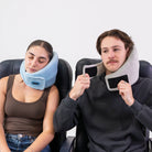 One traveler comfortably resting with the Airze travel pillow in blue, while another demonstrates how easy it is to put on the grey version, showcasing its adjustable fit and ergonomic neck support for travel comfort.