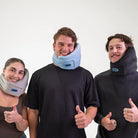 Airze Trios Bundle featuring three Airze travel pillows in grey, blue, and black, providing neck support and comfort for group travel.